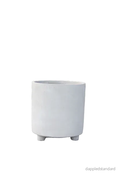 Kruka på tassar cement